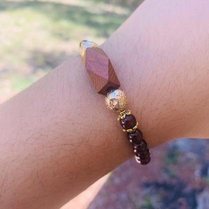 Garnet, Black Onxy, Gold Lava Rock And Wood Accent..
